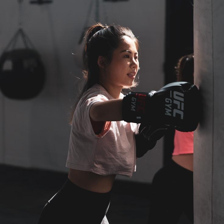 Interior of a professional gym with weight training equipment and mirrors